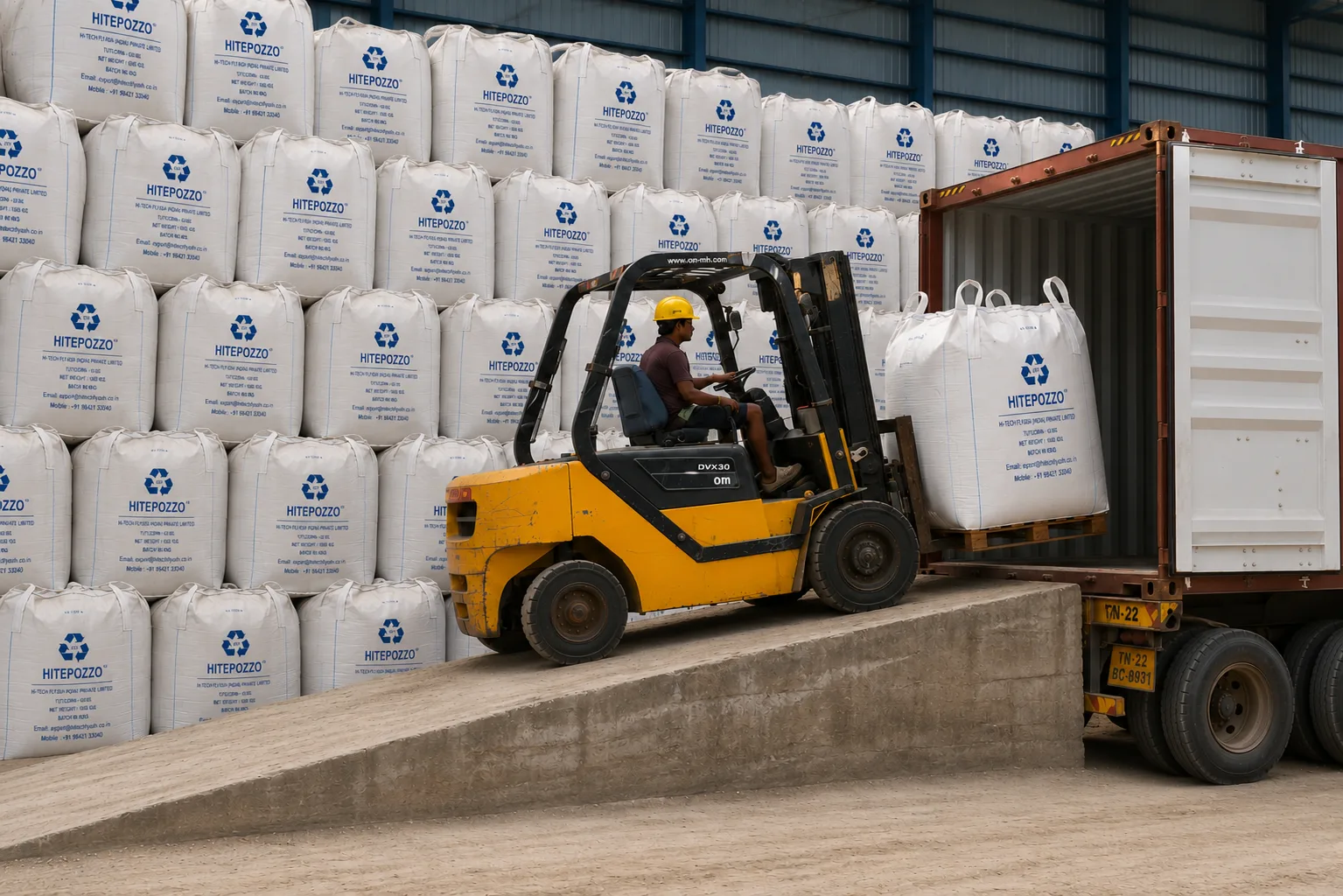Forklift stuffing container with jumbo bags